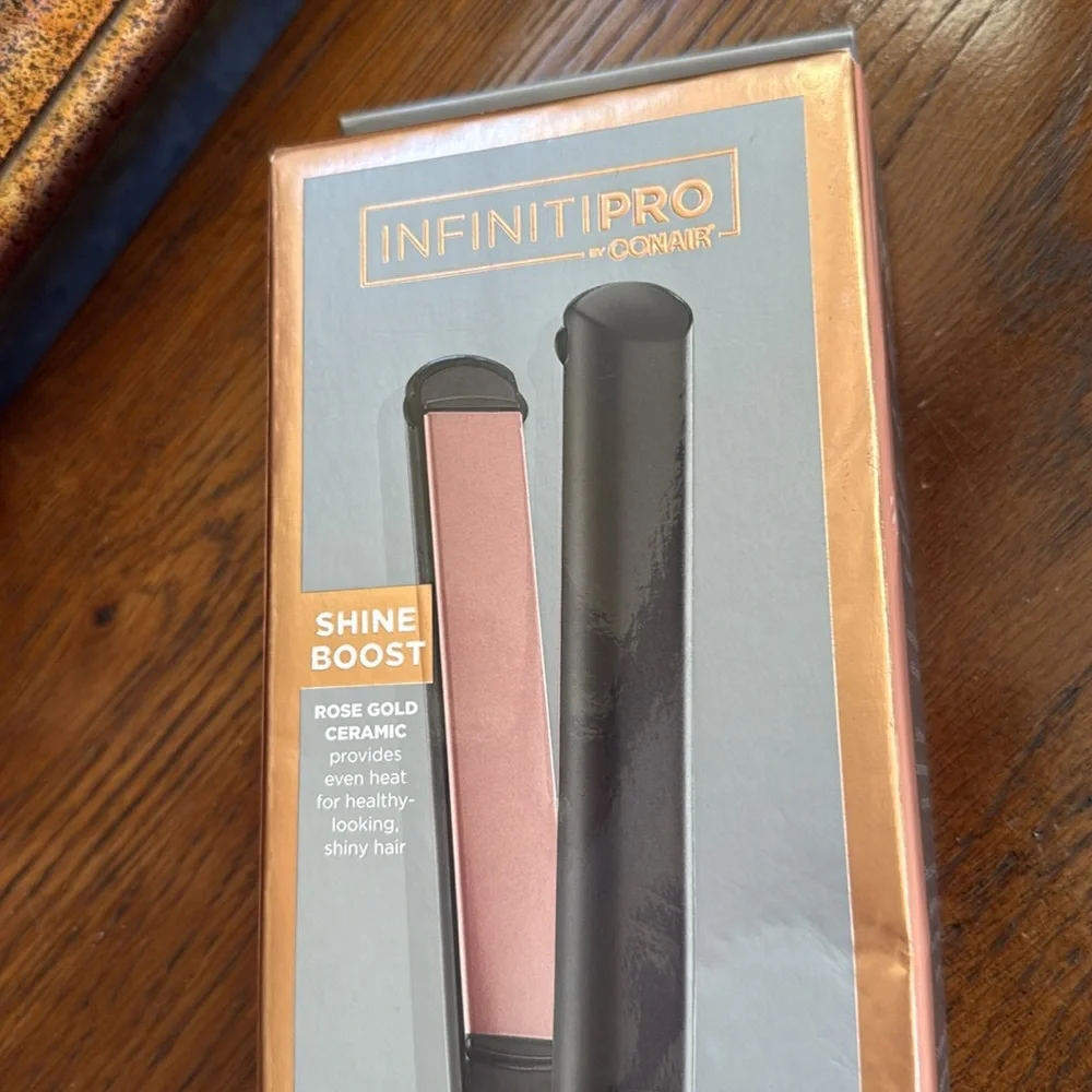 New InfinitiPRO Conair Hair Straightener. Rose gold ceramic, provides even heat.